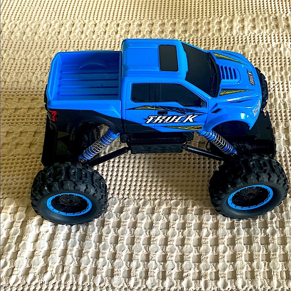 Amazon Blue and Black Monster Truck Toy